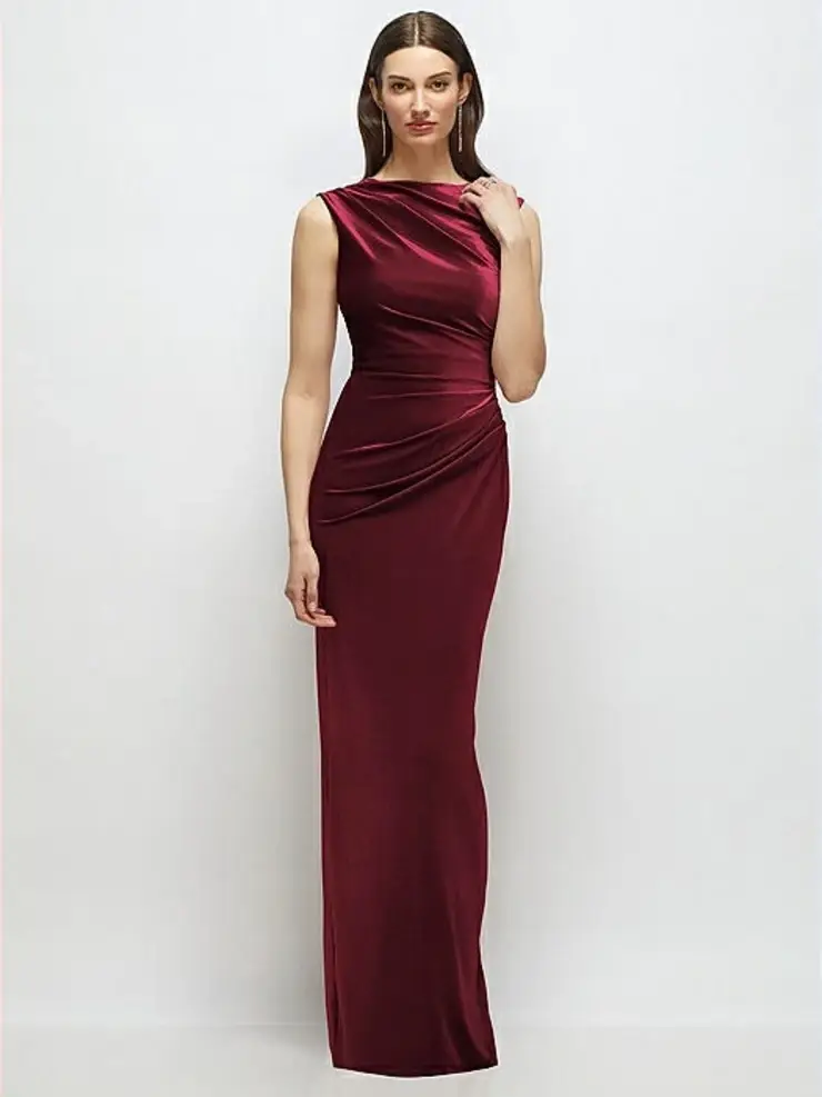 A model wearing a burgundy satin evening gown with a fitted silhouette and draped detailing on the side.