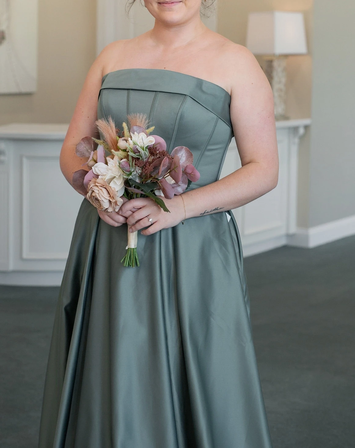 Photo of the model wearing a bridesmaids gown